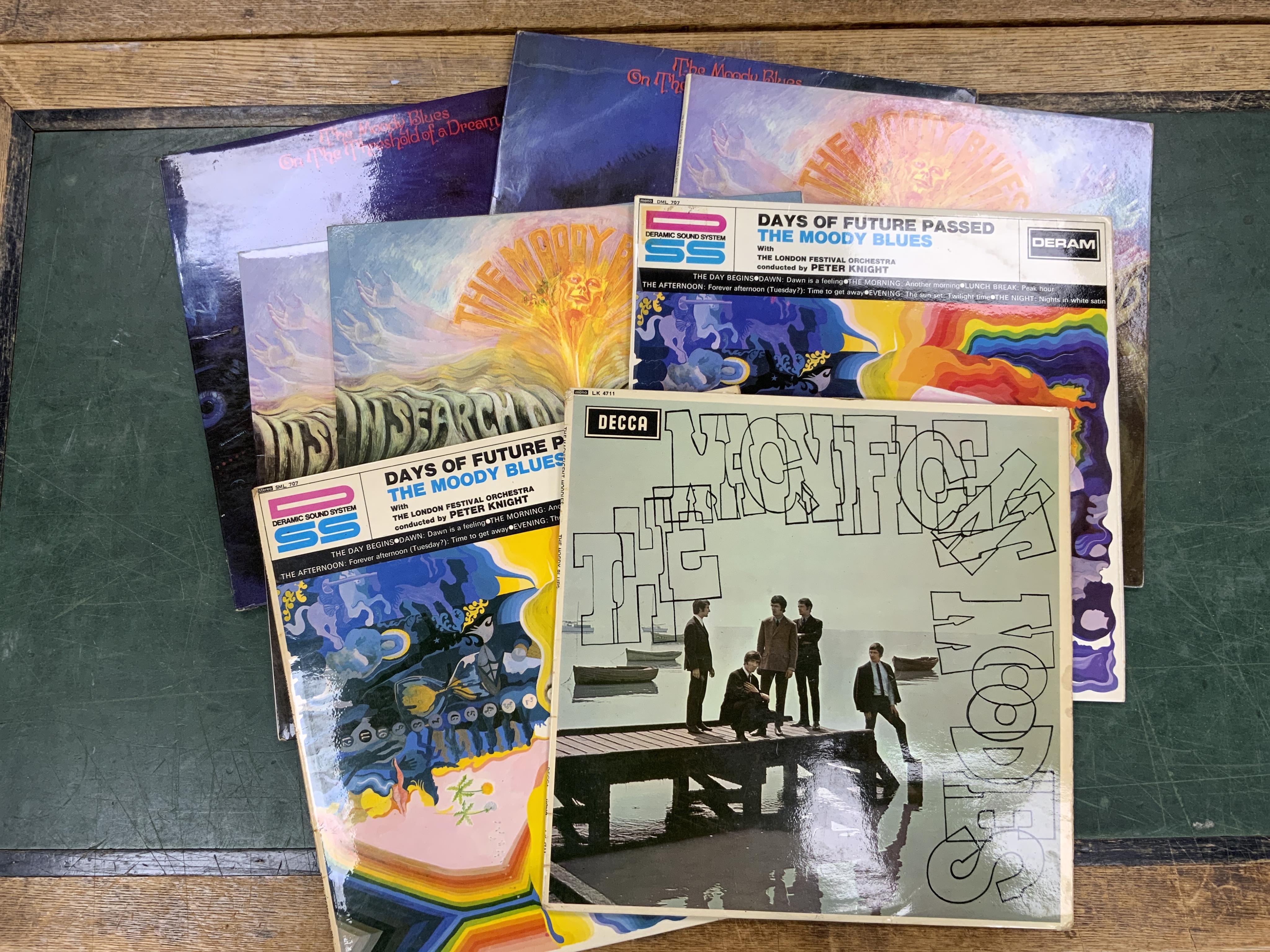 Eight The Moody Blues LP record albums including; The Magnificent Moodies, Days of Future Past, In Search of the Lost Chord, On the Threshold of a Dream, plus several duplicates. Condition - fair